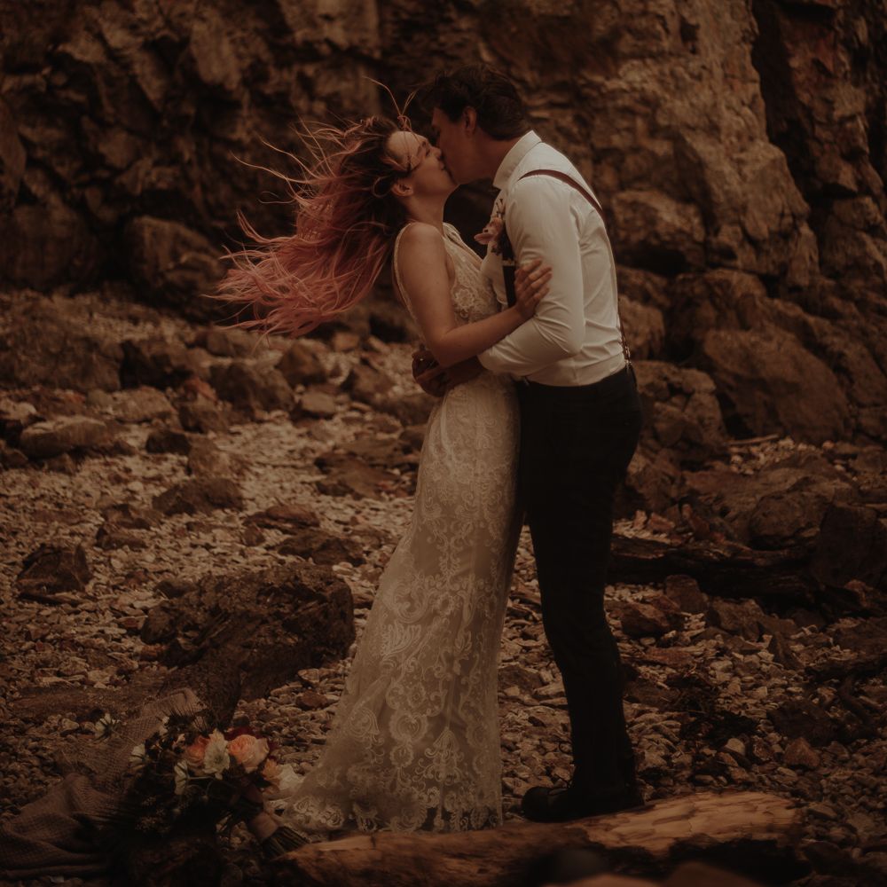 Bride and groom kissing at intimate wedding by Esme Whiteside Photography