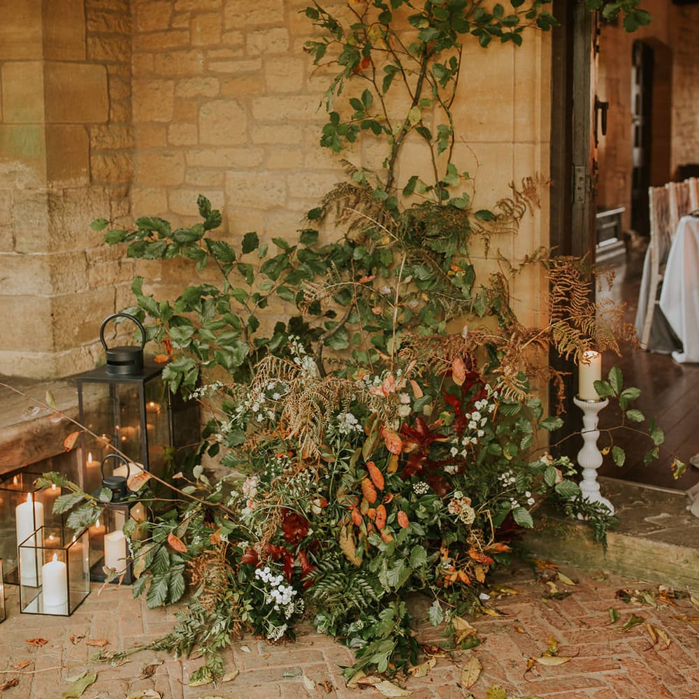 Autumn wedding flower arrangement with lanterns 