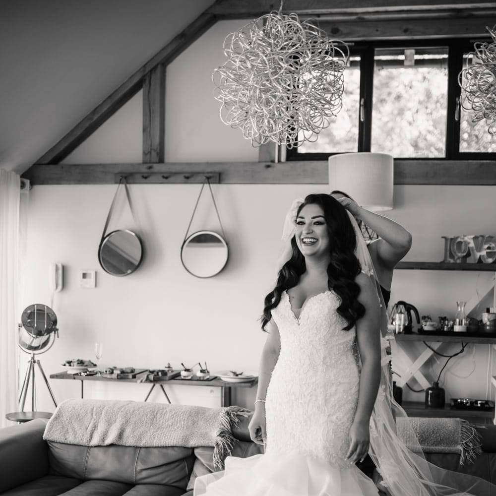 Wedding morning getting ready portrait with bride in a Mori Lee fishtail wedding dress