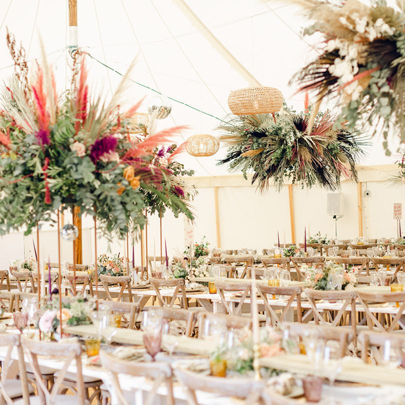 Beautiful hanging flower decoration at marquee wedding