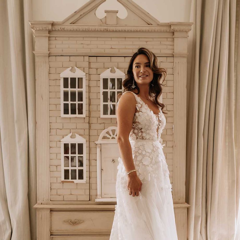 Bride in flower applique Wedding dress from Mira Zwillinger 