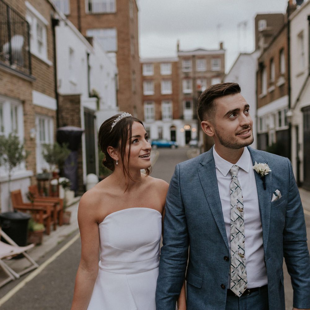 Bride in strapless Roland Mouret dress at intimate London wedding 