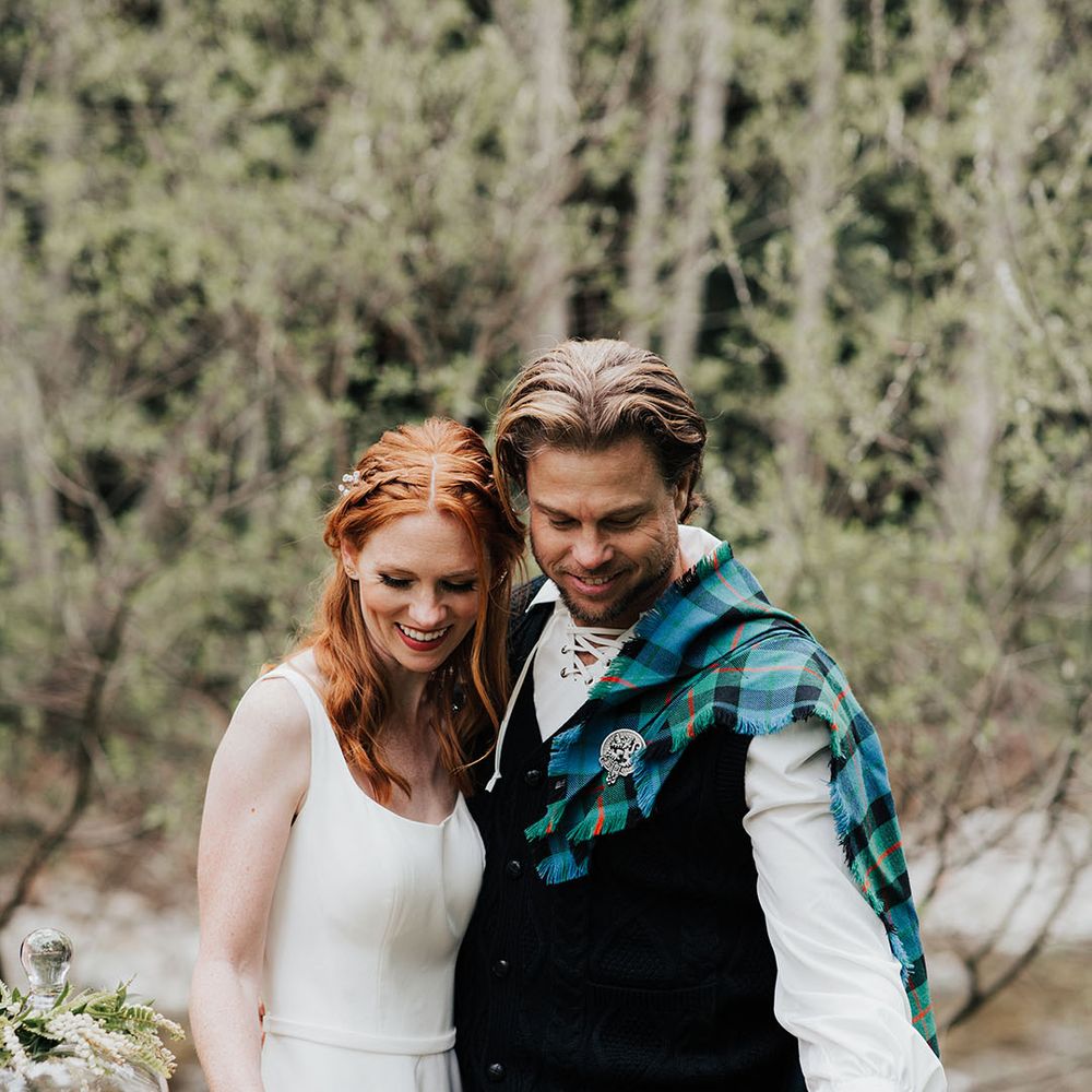 Blue and green Scottish wedding inspiration with bride and groom pairing whisky 