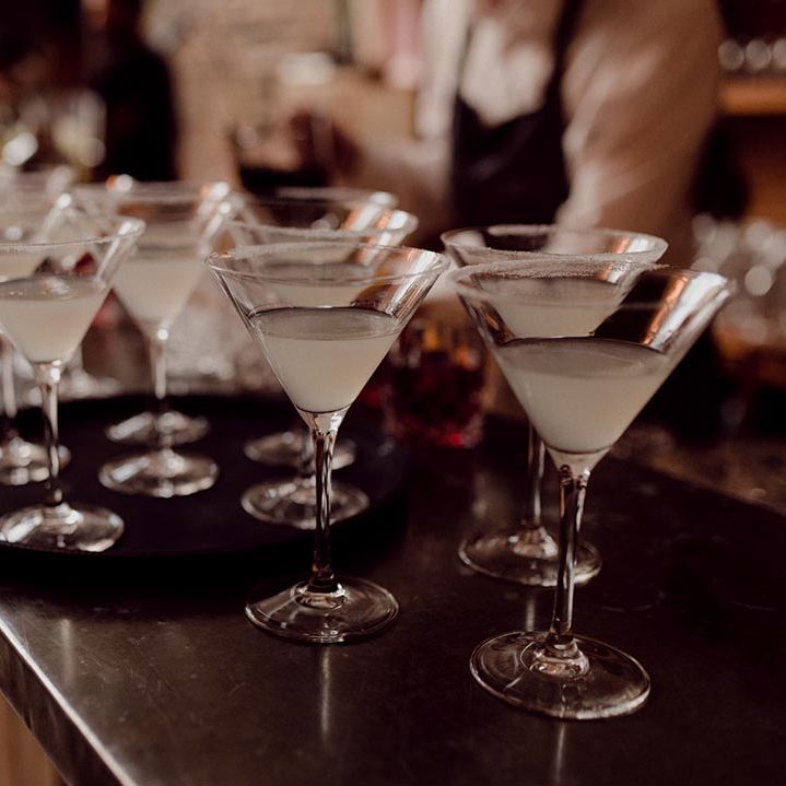 Cocktail glasses full f margaritas for wedding guests