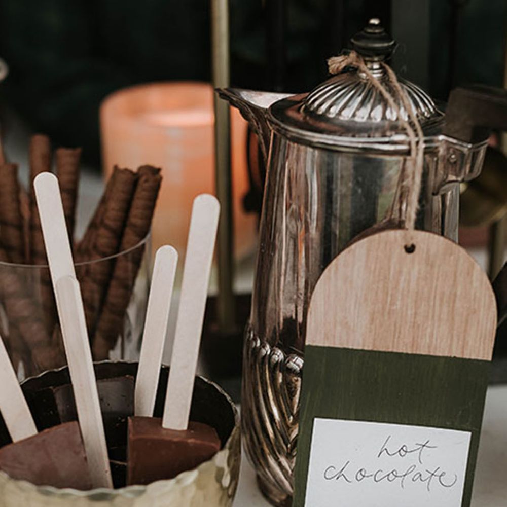 Hot chocolate station for Christmas winter wedding as non-alcoholic wedding bar idea