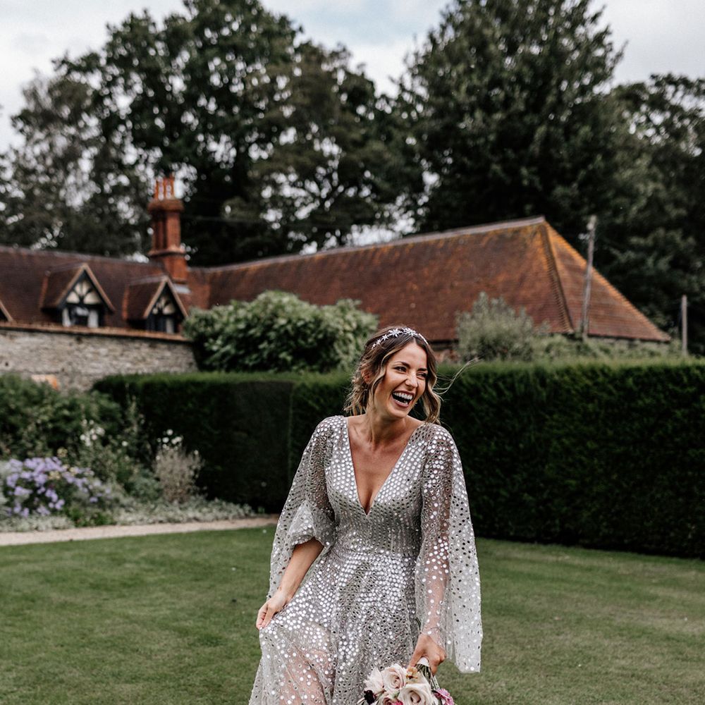 Stylish bride in a silver sequin wedding dress with Mia Miu shoes and Tilly Thomas Lux bridal crown 