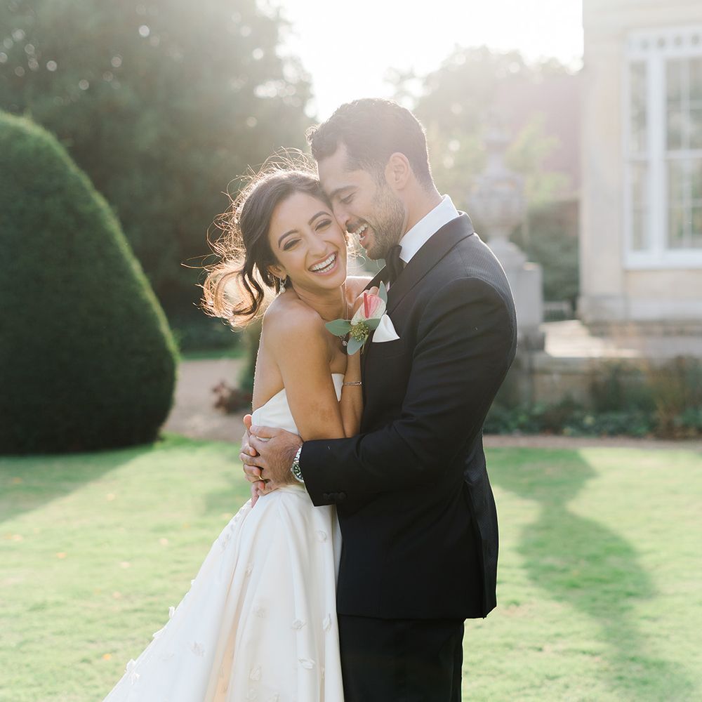 Bride & groom during couples portraits outdoors at Syon Park