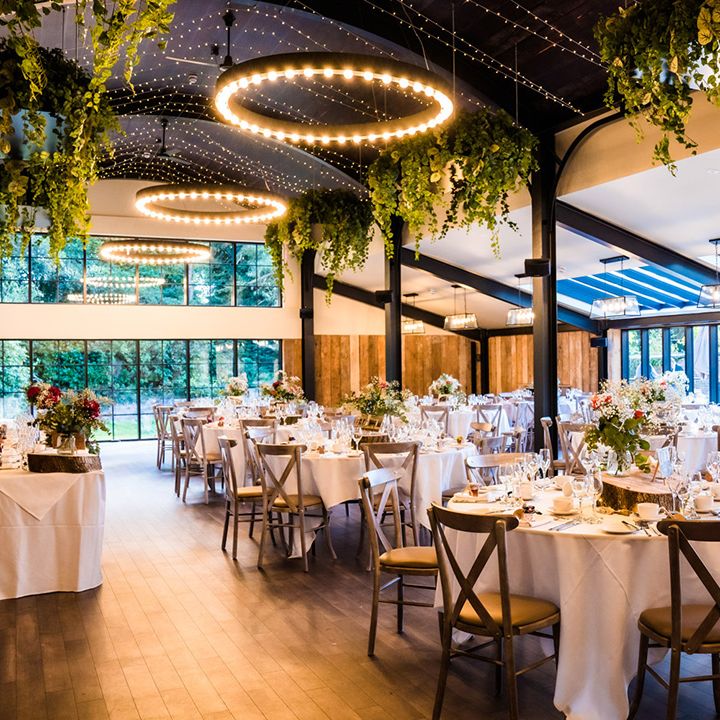 Wedding reception area at Foxtail Barns wedding venue with circle lights 