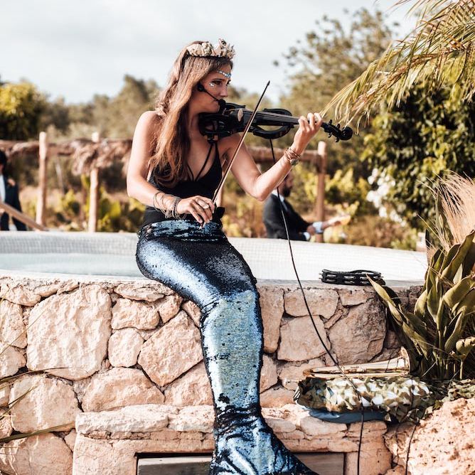 Mermaid violinist wedding ceremony music at Ibiza destination wedding