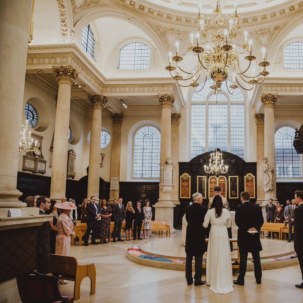 St Stephen Walbrook Church wedding ceremony with chandeliers 