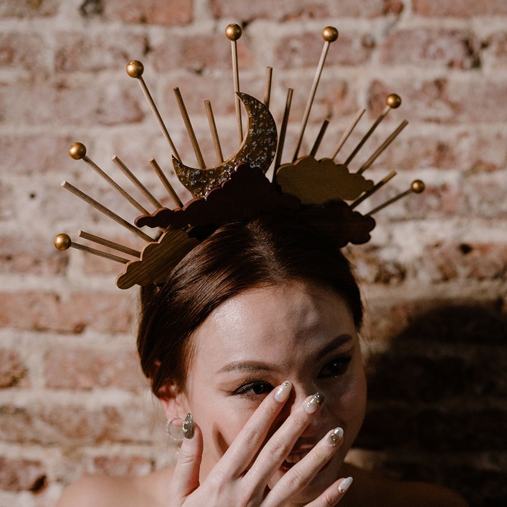 Bride with a celestial headdress and stylish nail art 