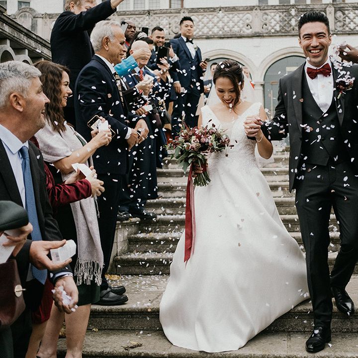 Confetti moment for bride and groom