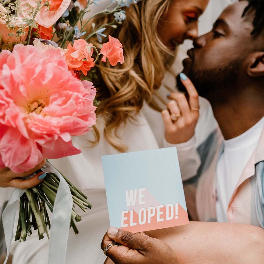 We eloped pastel wedding stationery design with bold font. 