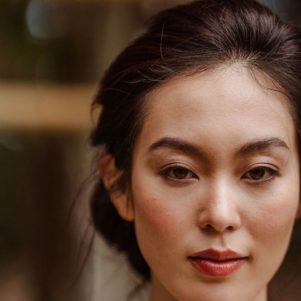 East Asian bride at Japanese wedding with natural wedding makeup 