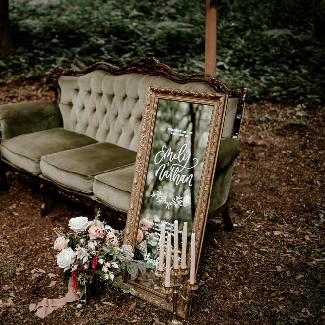 Mirror wedding sign in the woods at Sherwood Glade