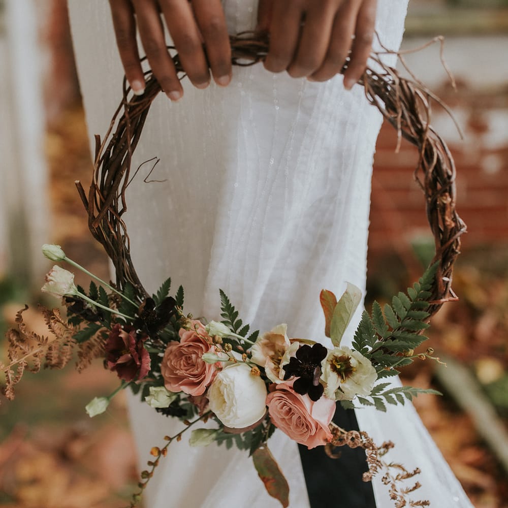 Autumn hoop bouquet with twigs and flowers 