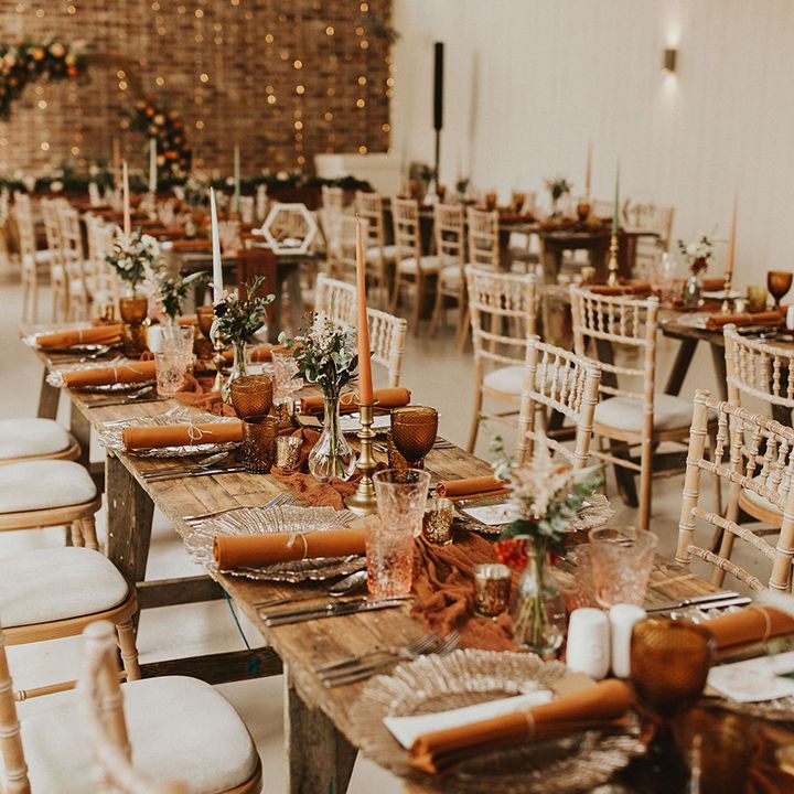 Rust wedding table decor at barn wedding