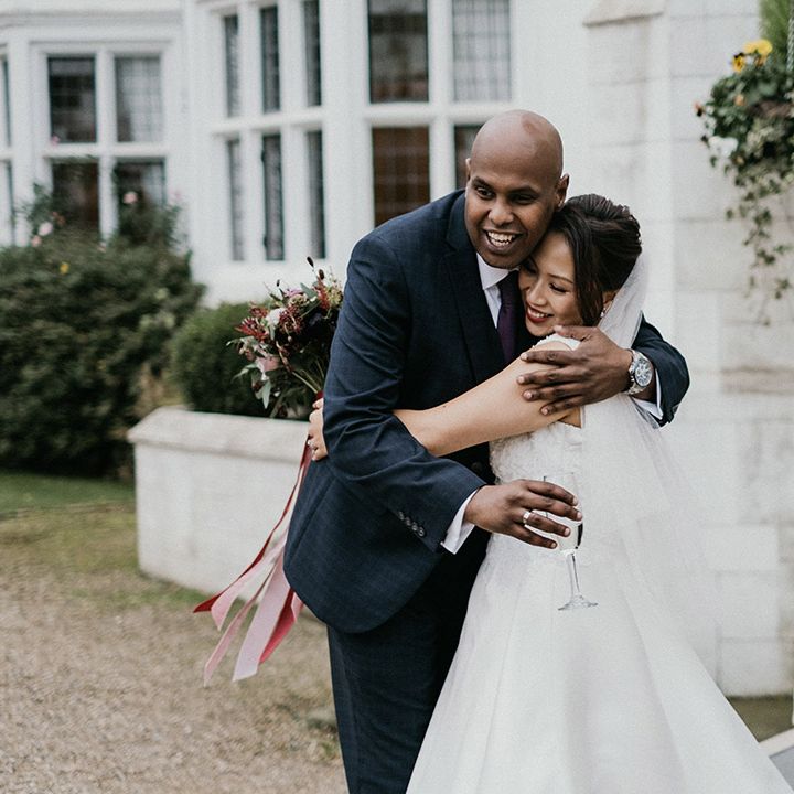 Bride hugs wedding guest