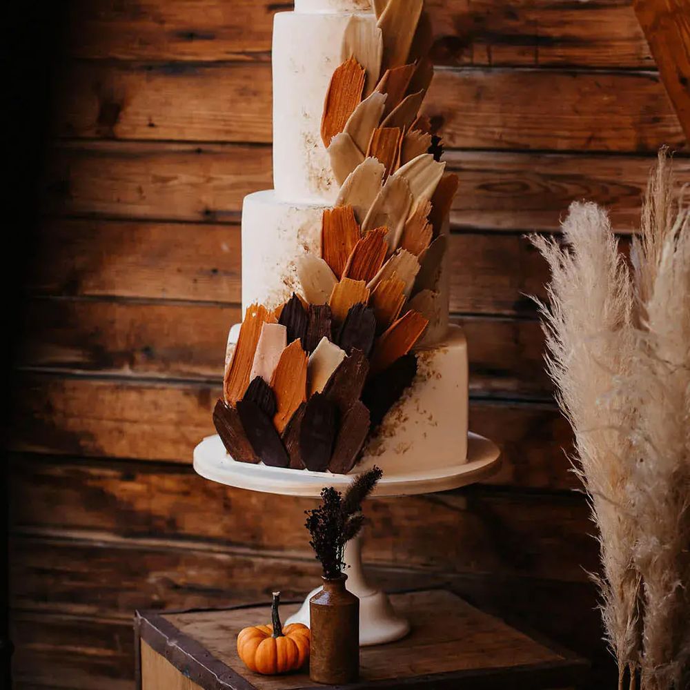 Autumn-coloured wedding cake for halloween wedding by Olegs & Rita Photography 