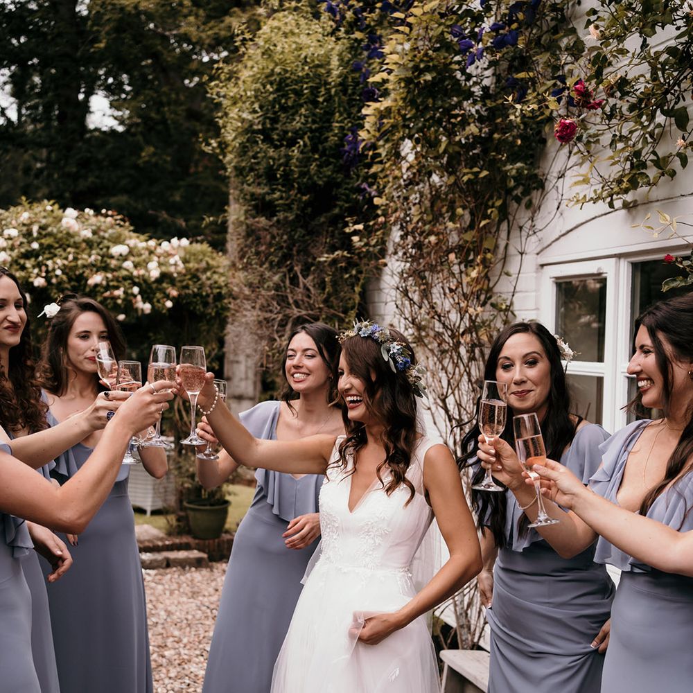 Powder blue bridesmaid dresses with ruffle detail for blue wedding theme 