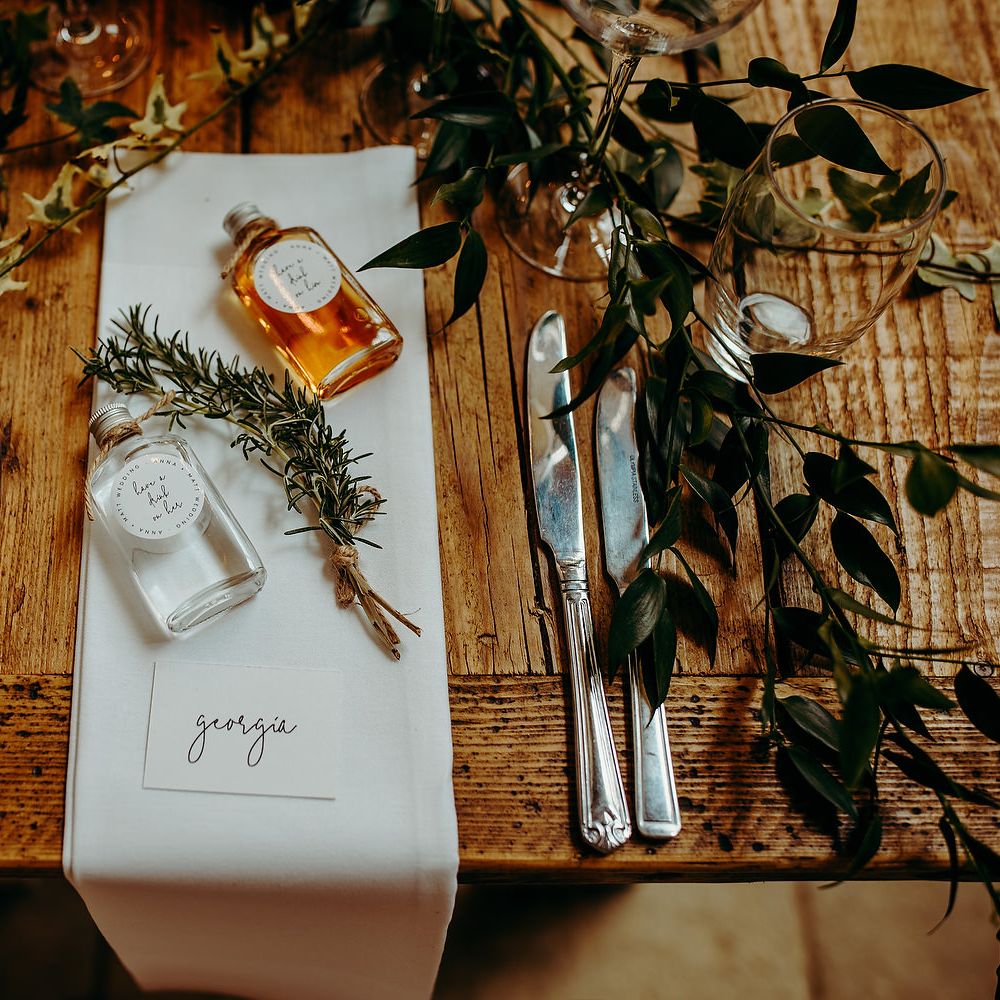 Table decor with brown string tied rosemary 