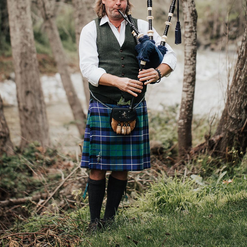 Bagpiper at Scottish highland wedding inspiration 