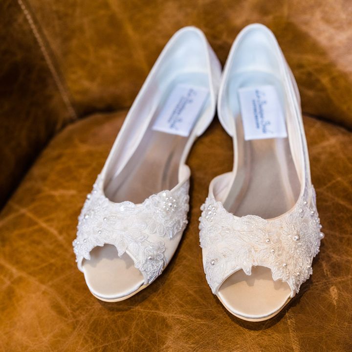 Lace and pearl embellished wedding shoes for lesbian wedding at Foxtail Barns venue 