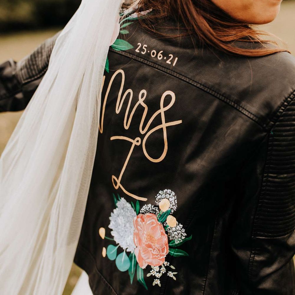 DIY bespoke leather jacket with painted on roses and lettering