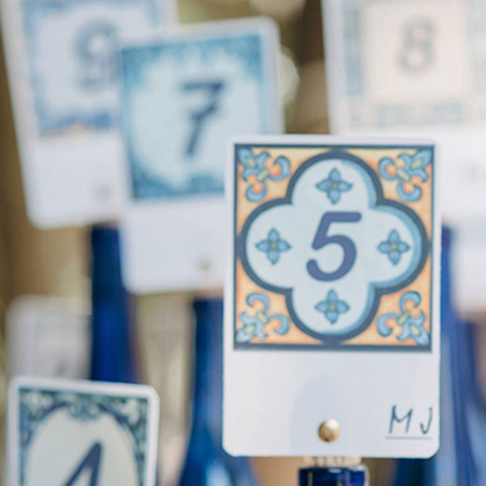 Blue and white wedding table number signs for destination wedding 