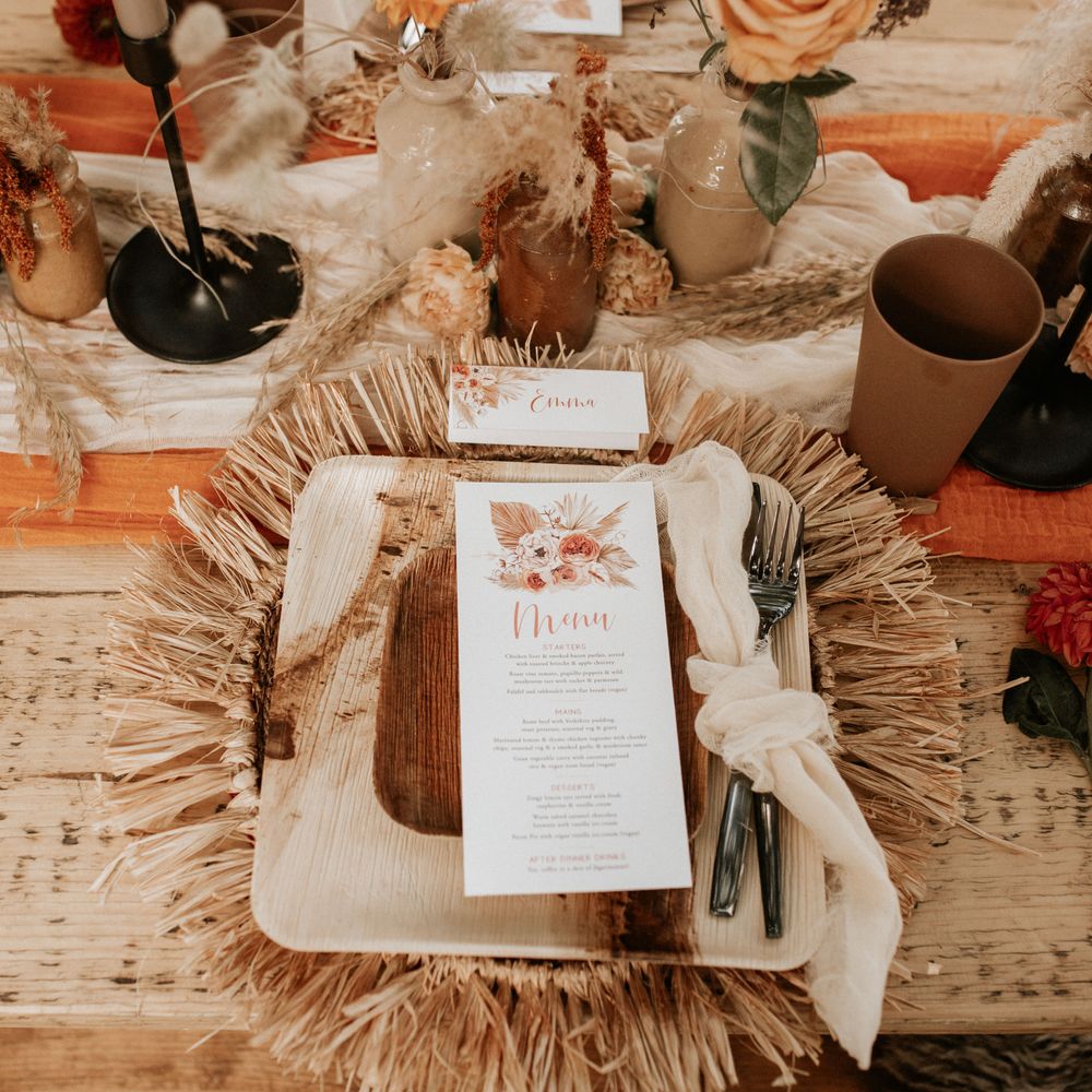 Autumnal table decoration with wooden plates