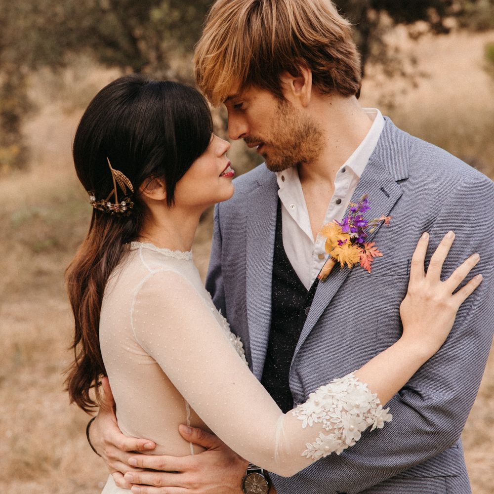Bride & groom embrace during Spanish elopement in the mountains