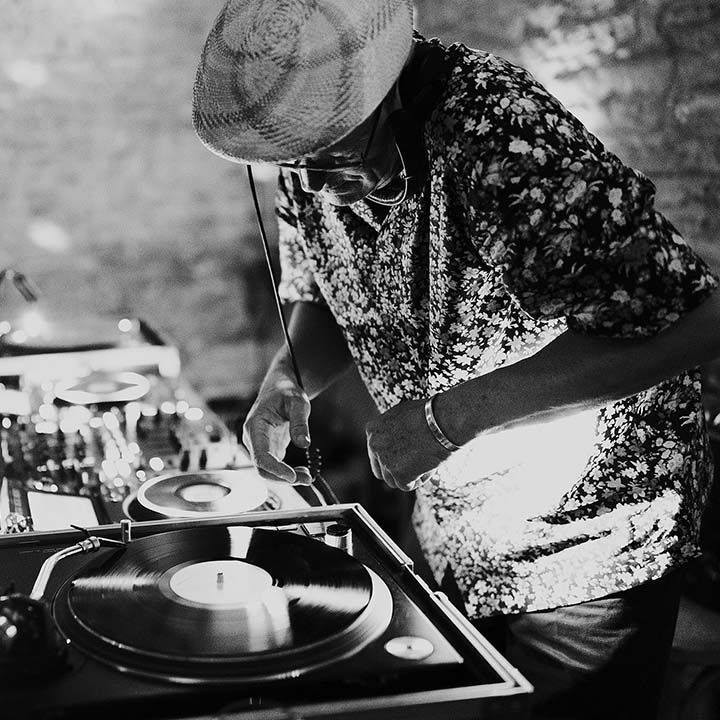 DJ plays during wedding reception party at the Stone Barn Cotswolds 