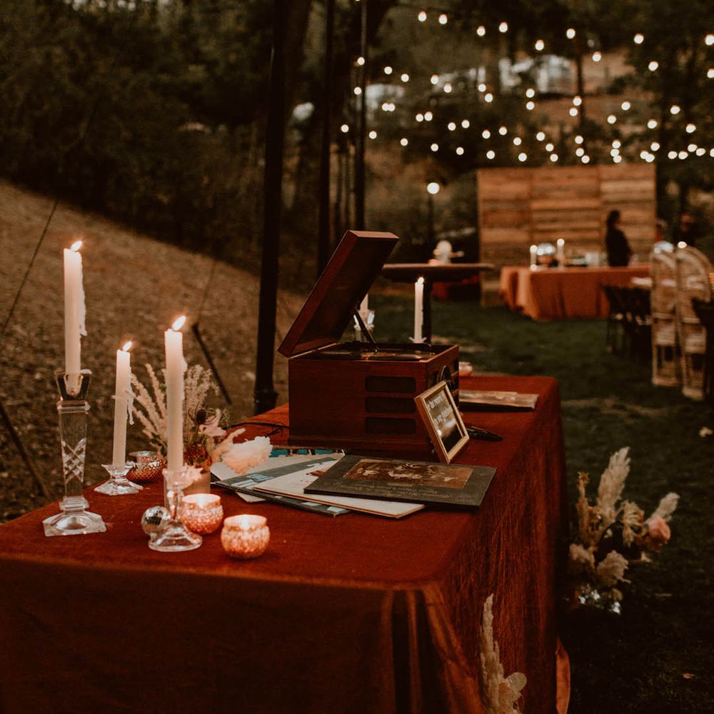 Outdoor table complete with deep red cloth