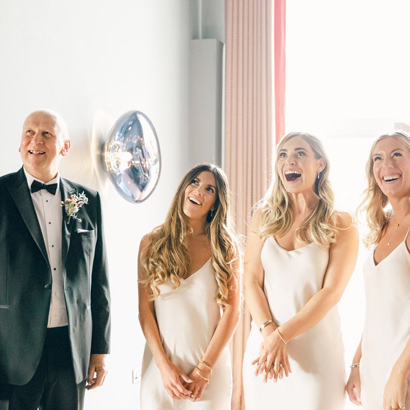 Bridesmaids in neutral dresses 
