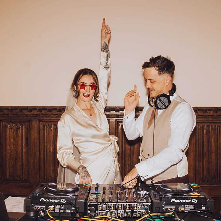 Bride & groom play DJ set on the day of their wedding at St Audries Park