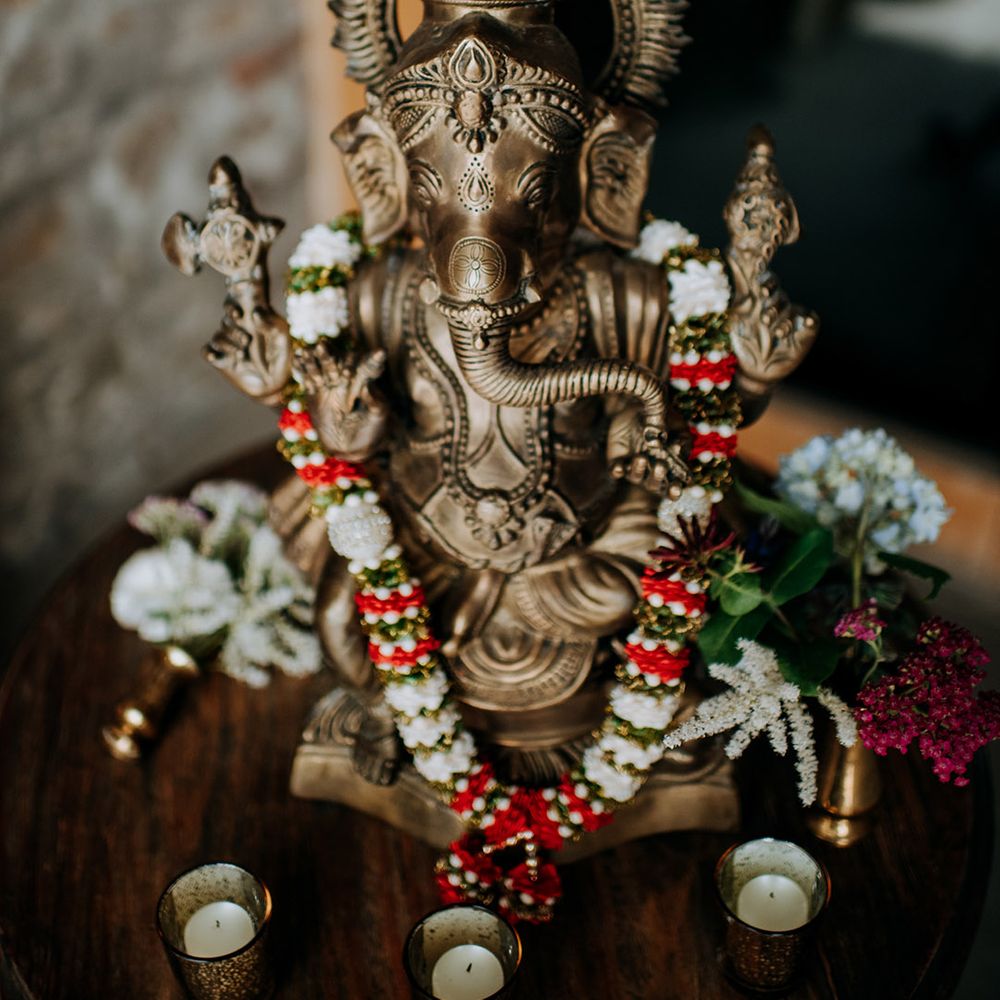 Ganesh complete with colourful lei for Hindu wedding ceremony