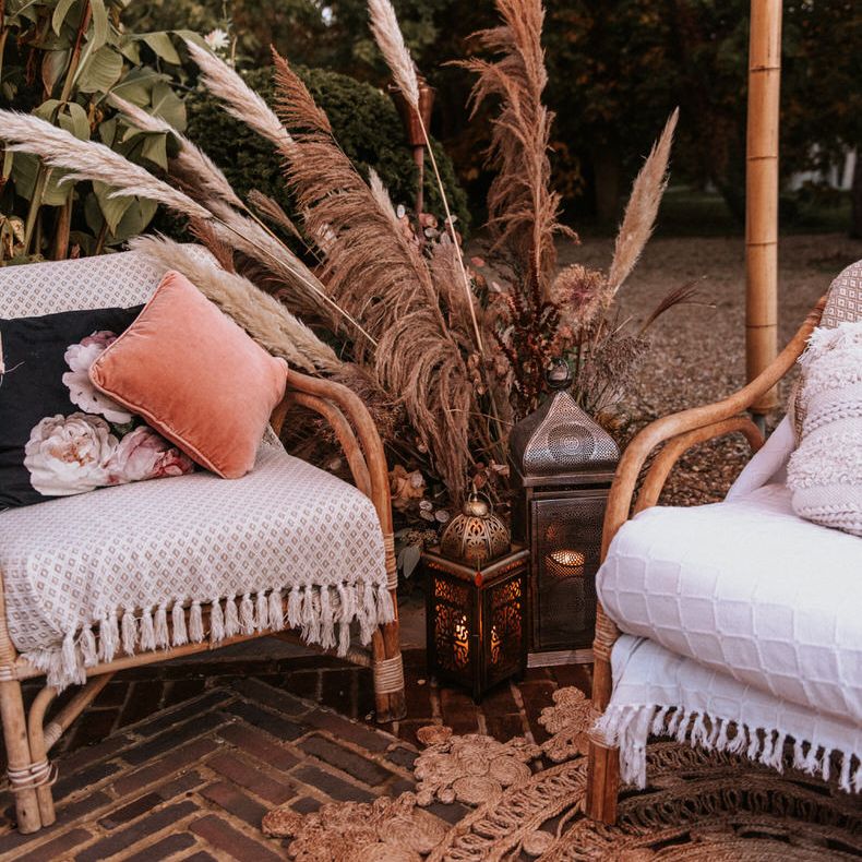 Boho cushion details on rattan wedding furniture