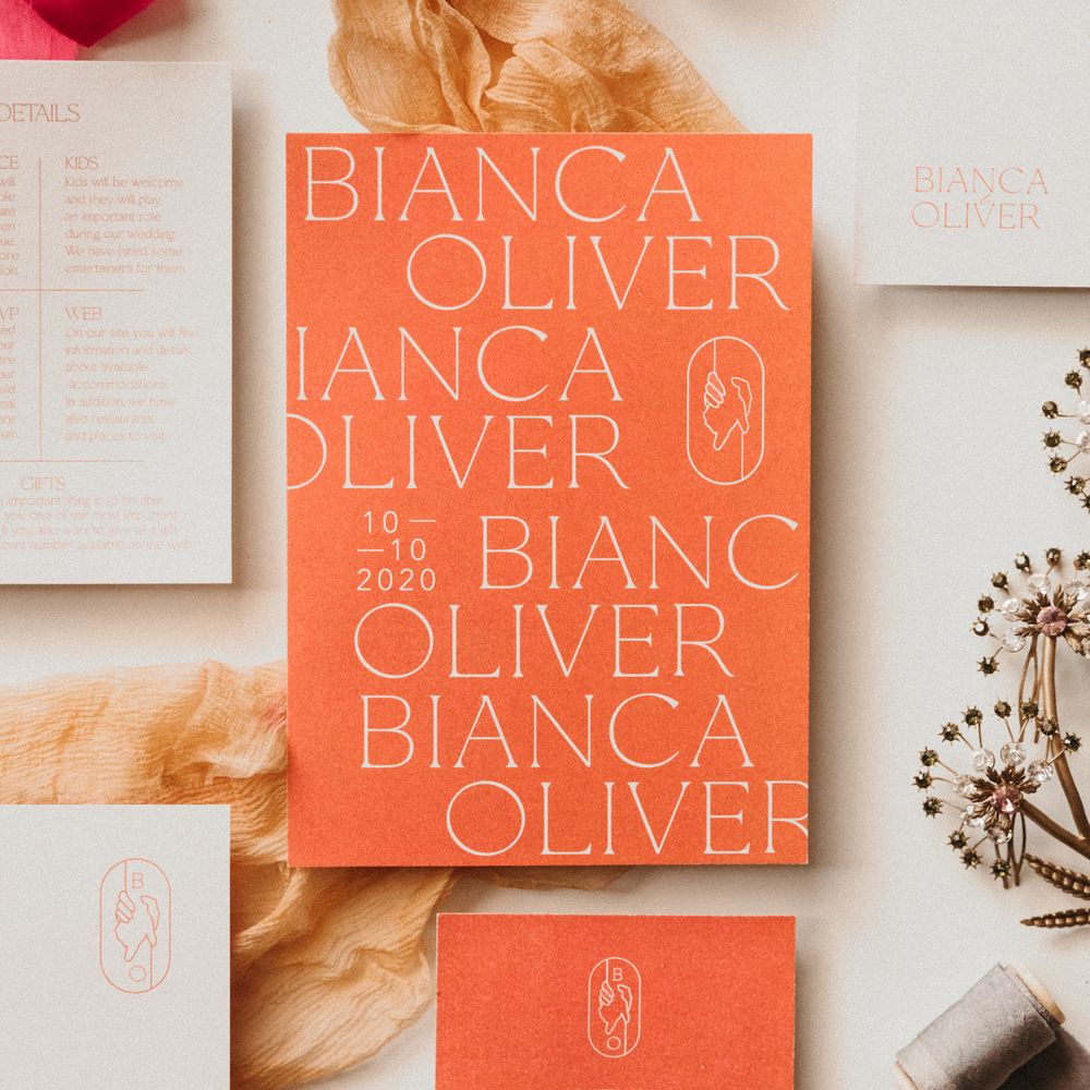 Orange & white wedding stationery in contemporary design