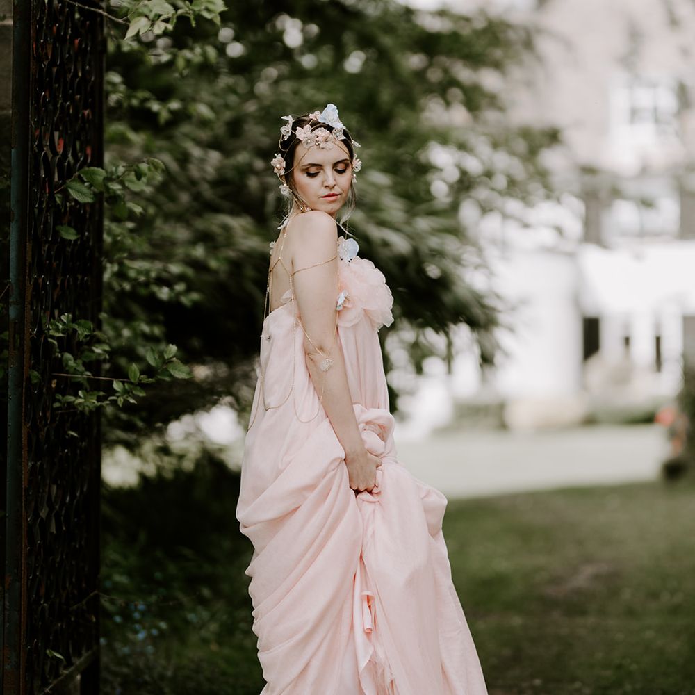 Boho bride in a blush pink Felisiti Greis wedding jumpsuit and chain headdress with clear perspex block heel sandals 