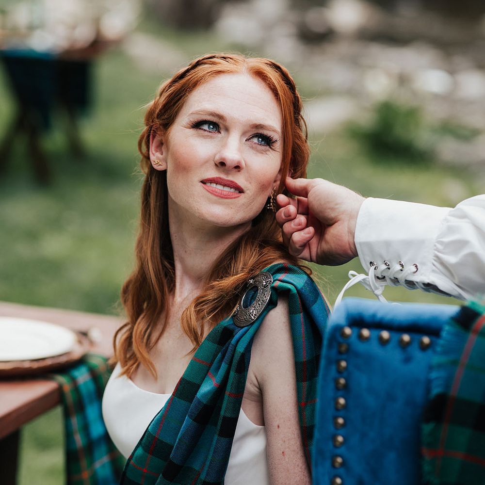 beautiful red headed bride with half up half down wedding hair and natural wedding makeup 