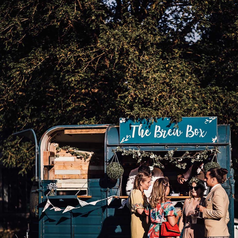 Blue mobile bar called 'The Brew Box' hired from pub for wedding drinks 