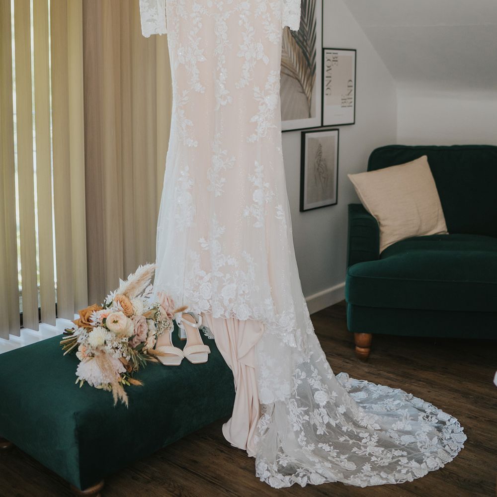 Long sleeve lace wedding dress with sweetheart neckline 