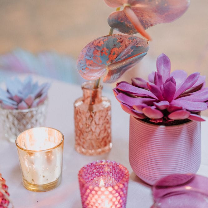 Spray painted cactus and anthuriums in vases 