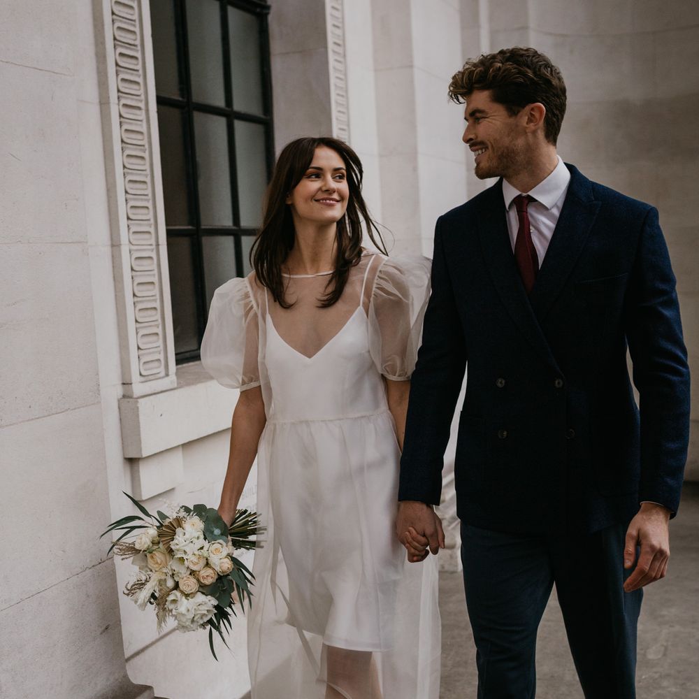 Stylish bride and groom outfits for intimate wedding ceremony 