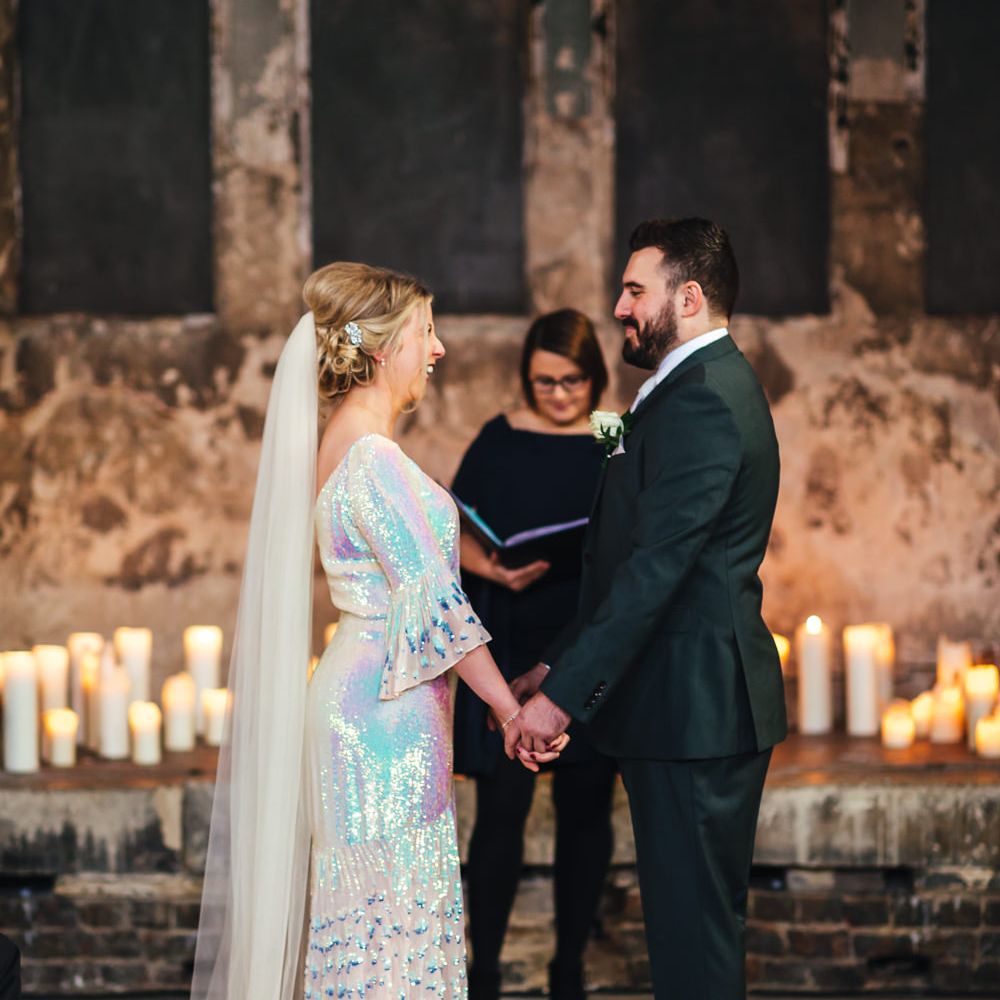 Bride & groom say their vows during wedding ceremony