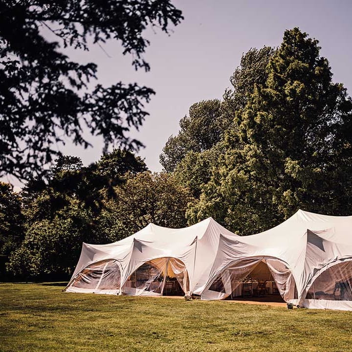 Marquee for the wedding reception after he outdoor wedding ceremony 