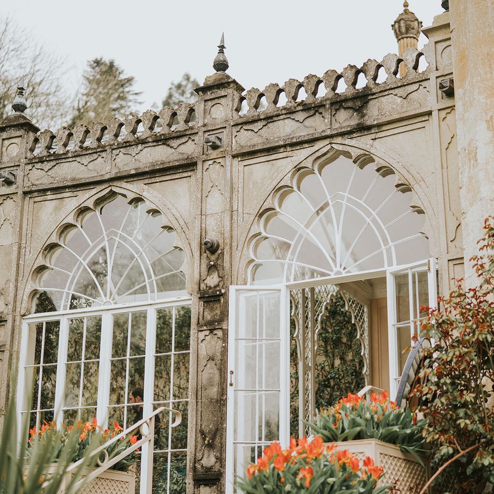 Sezincote House wedding venue with an orangery with tulip flowers 