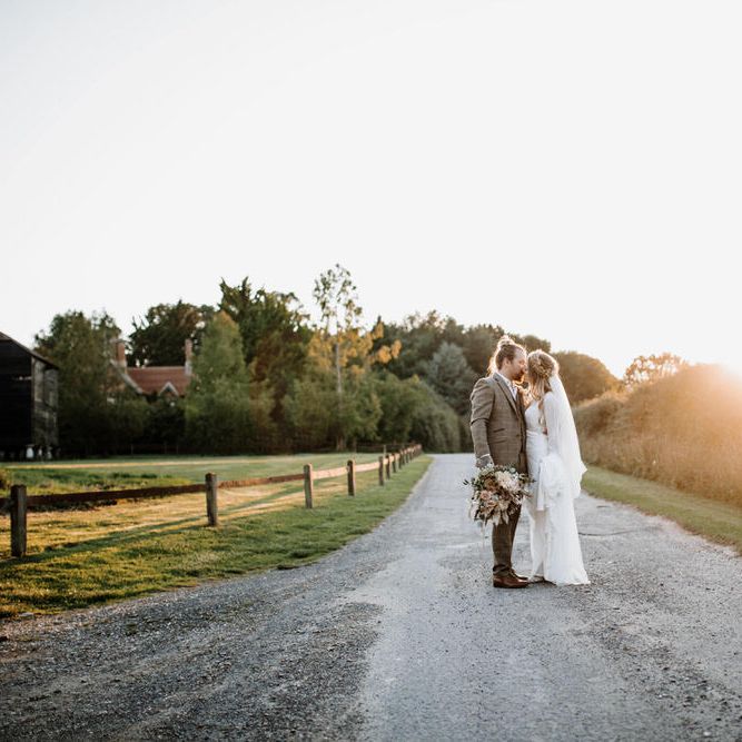 Outdoor barn wedding photography at sunset 