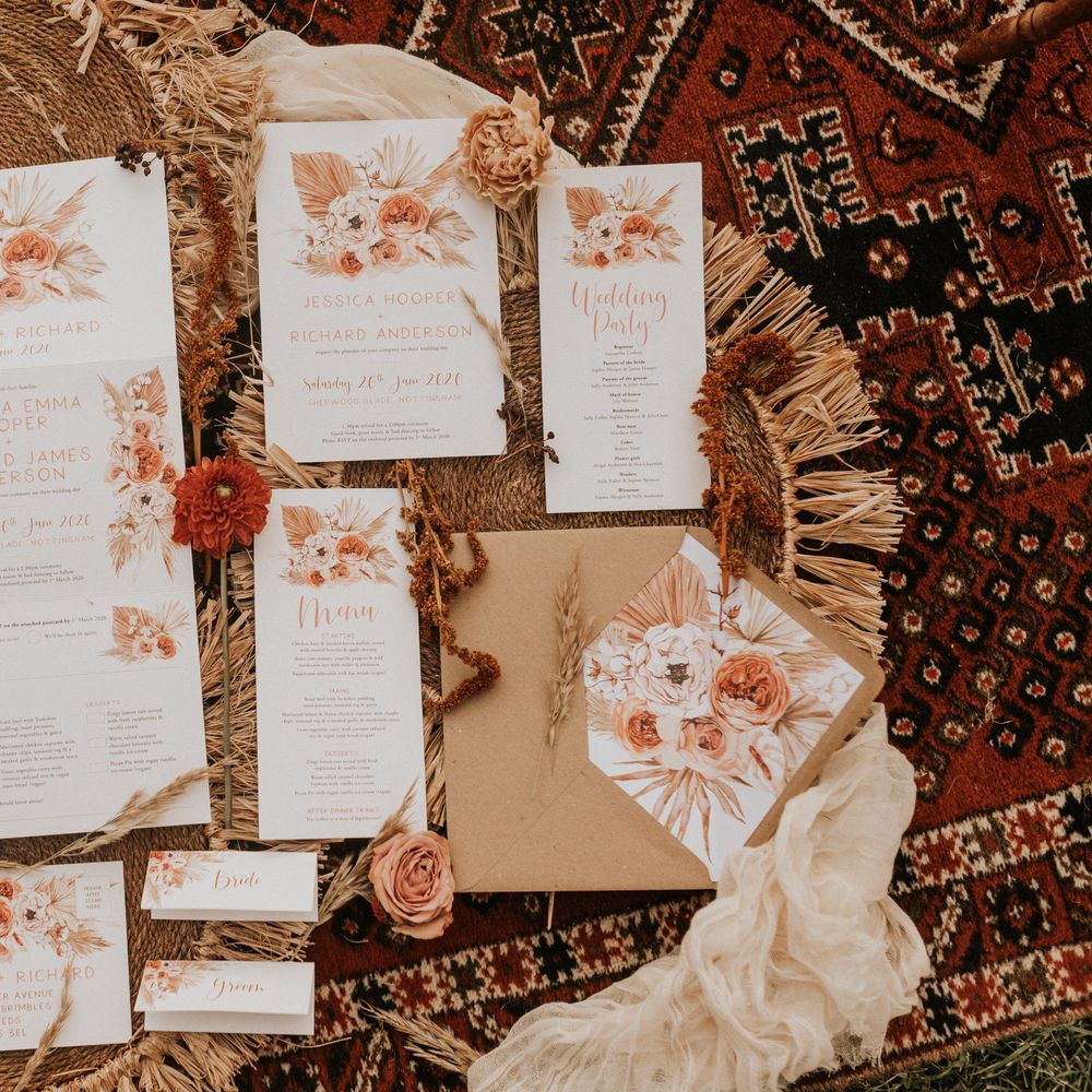 Stationery with floral theme in oranges 