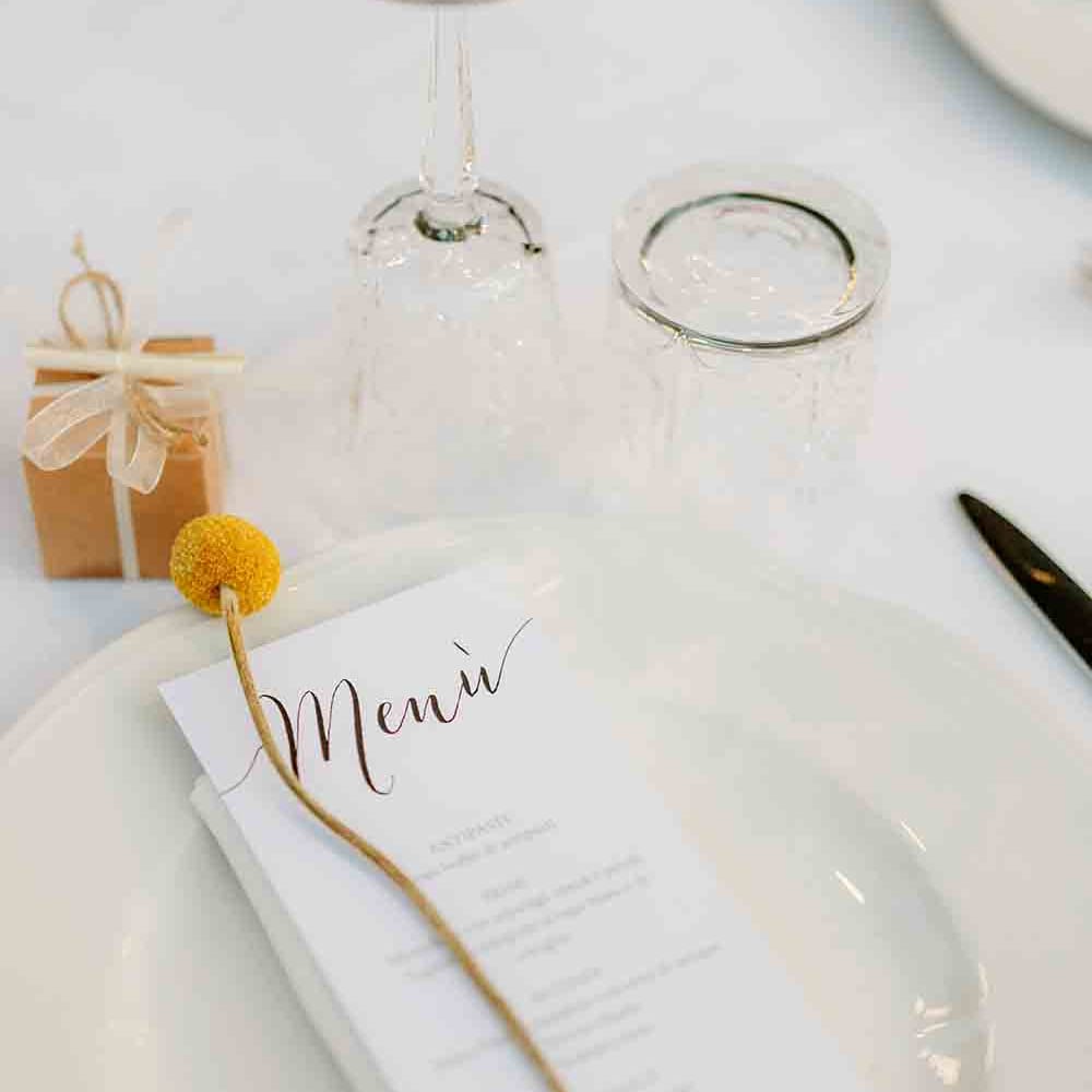 Wedding place setting at romantic Italian wedding